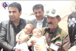 نجات دوقلوی 10ماهه از زیر آوار زلزله مشهد+عکس
