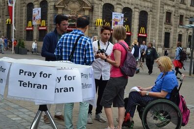 گرامیداشت یاد قربانیان حوادث تروریستی تهران در آلمان